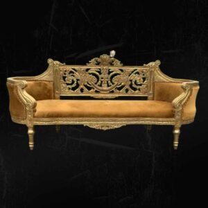 Elegant gold-accented vintage sofa